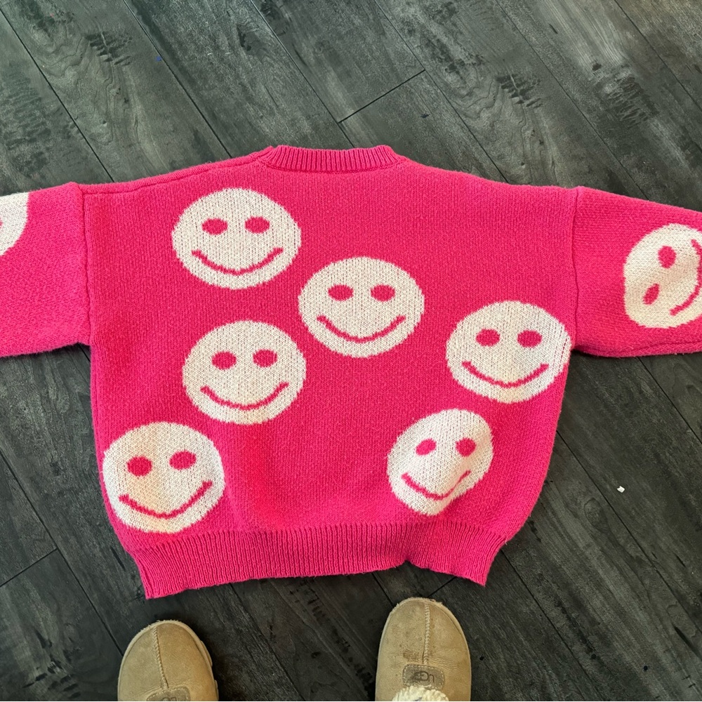 Good quality happy face sweater.